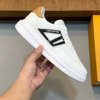 Louis Vuitton LV Trainer Blanco Negro Cuero Perforado Bold Side Logo Sneakers Lifestyle