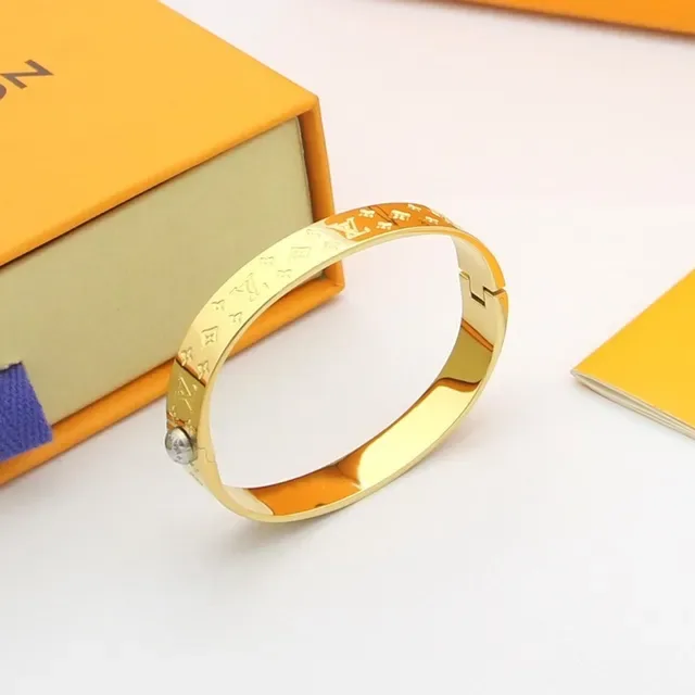 Louis Vuitton Monogram World Engraved Cuff Bracelets 4
