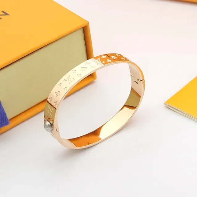 Louis Vuitton Monogram World Engraved Cuff Bracelets 5
