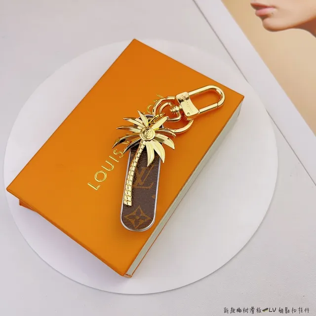 Louis Vuitton Étui téléphone palmiers marron doré monogramme toile charme 7