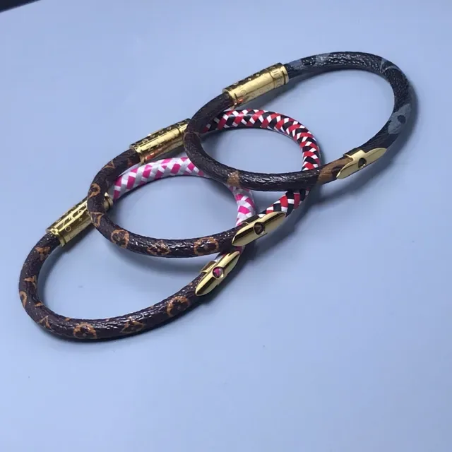 Louis Vuitton pulseira serpente marrom monograma e pulseira de couro trançado vermelho preto branco 9