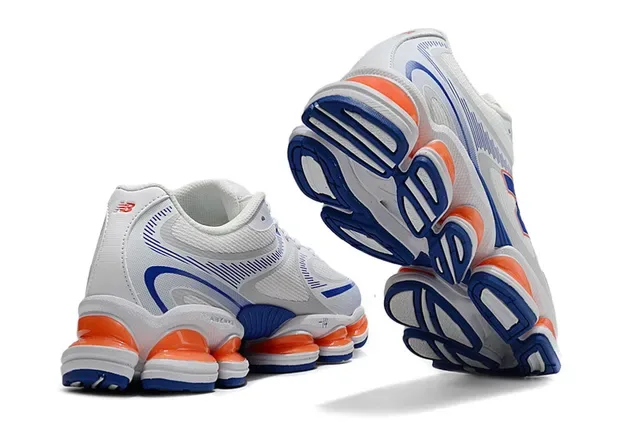 New Balance 9060 White Blue Segmented Orange Midsole Pods Mesh And Synthetic Overlay Upper Chunky Sneakers 3