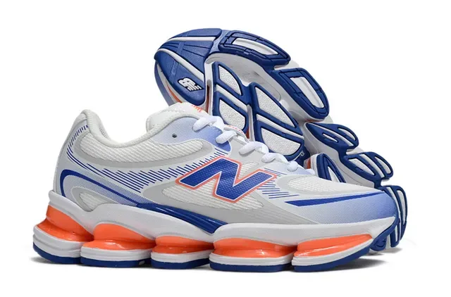 New Balance 9060 White Blue Segmented Orange Midsole Pods Mesh And Synthetic Overlay Upper Chunky Sneakers 4