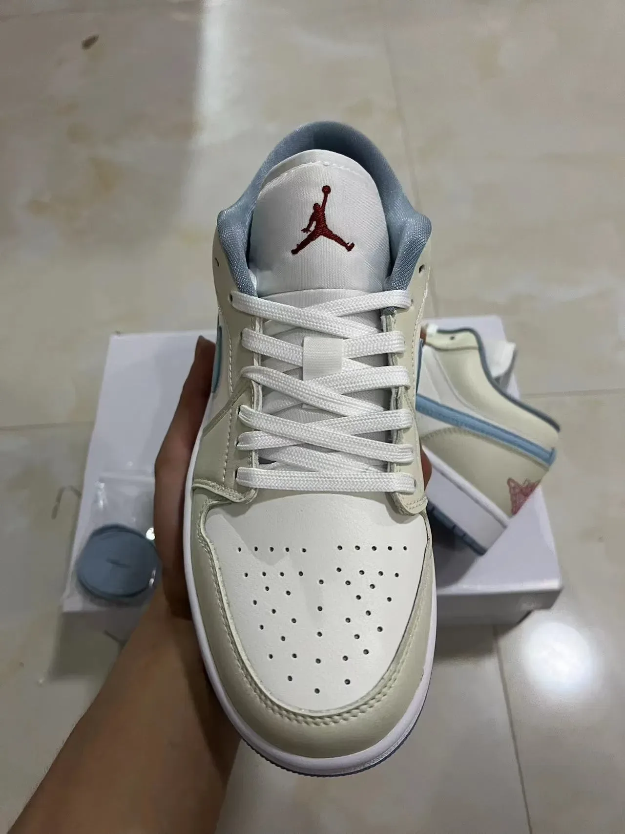 Nike Air Jordan 1 Low Light Blue and Cream Lifestyle Sneakers 2
