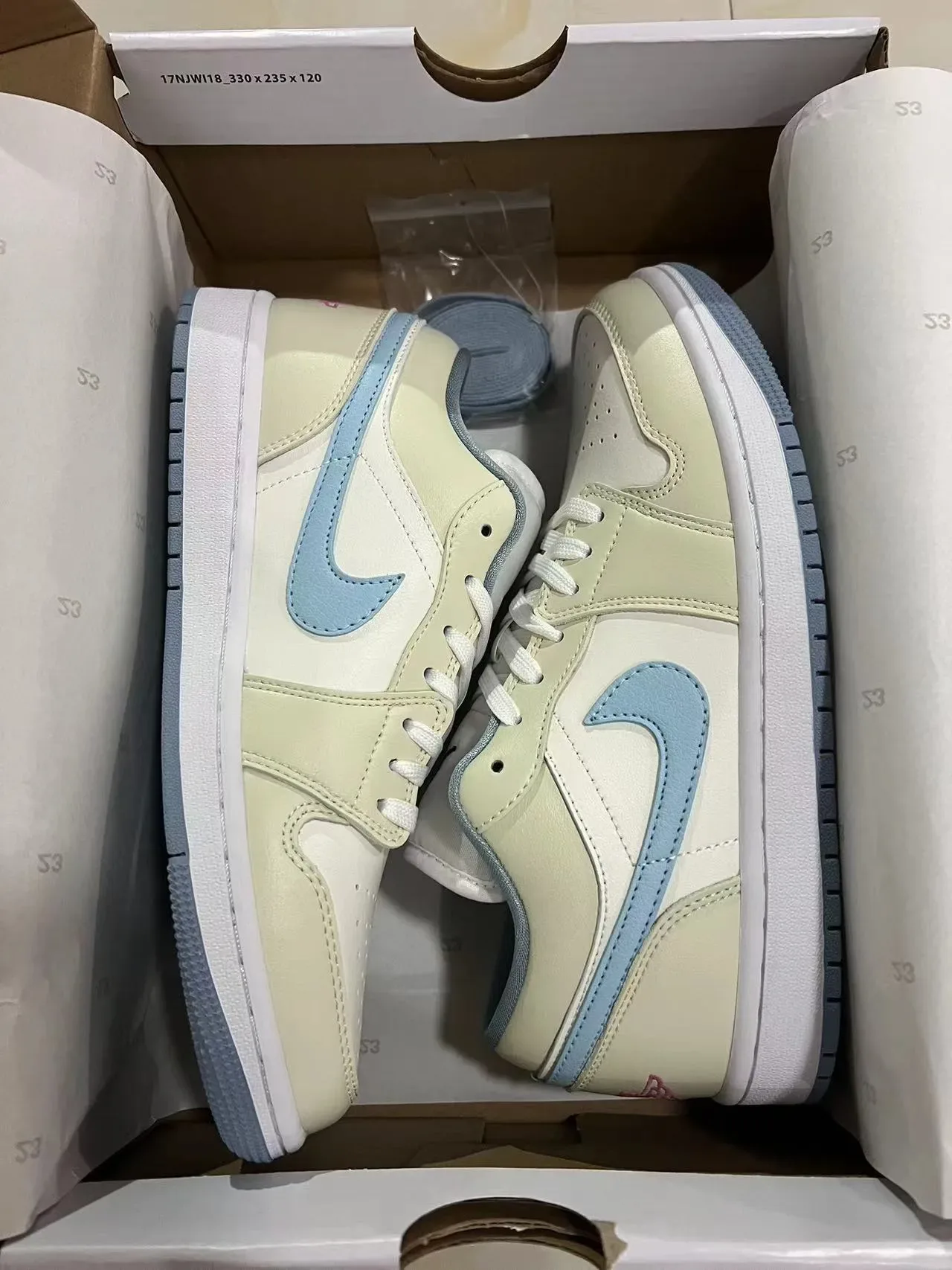 Nike Air Jordan 1 Low Light Blue and Cream Lifestyle Sneakers 8