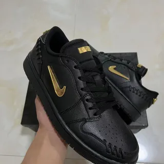 نيك أسود ذهبي جلد مصقول أعلى معدني Swoosh أسلوب حياة أحذية