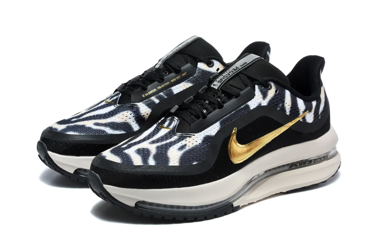 Zapatillas de running Nike negro y dorado con estampado de cebra en la parte superior de tela y Swoosh metálico 4