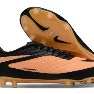 Nike काला नारंगी लो-कट सिन्थेटिक अपर टेक्स्चर्ड हनीकॉम्ब फोरफुट फर्म ग्राउंड फुटबॉल जूते