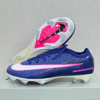 Nike Chaussures de football bleu rose upper en tricot col bas terrain ferme