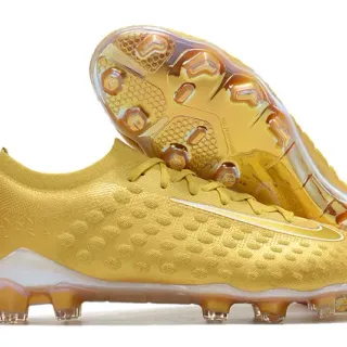 Nike Chaussures de football avec upper en maille doré transparent métallique, superficie texturée à points et surface ferme
