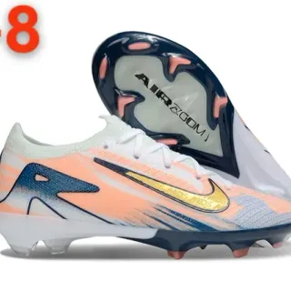 Nike Phantom GT Chaussures de football upper knit orange marine gradient terrain ferme