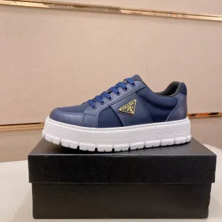 Prada Cloudbust Navy White Paneled Leather Upper Gold-Tone Triangular Logo Chunky Sneakers