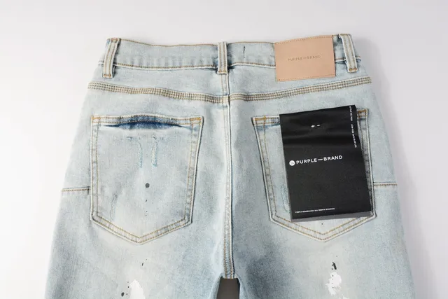 Purple Brand shorts de denim distressed con salpicaduras de pintura y lavado ligero 4