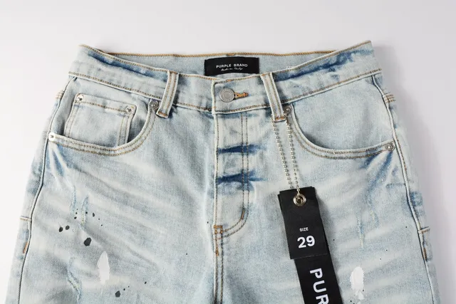 Purple Brand shorts de denim distressed con salpicaduras de pintura y lavado ligero 12