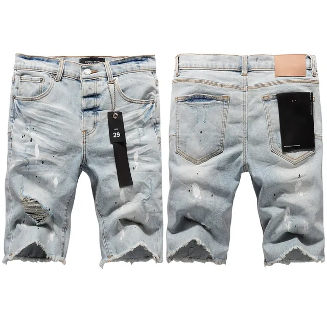 Purple Brand shorts de denim distressed con salpicaduras de pintura y lavado ligero 13