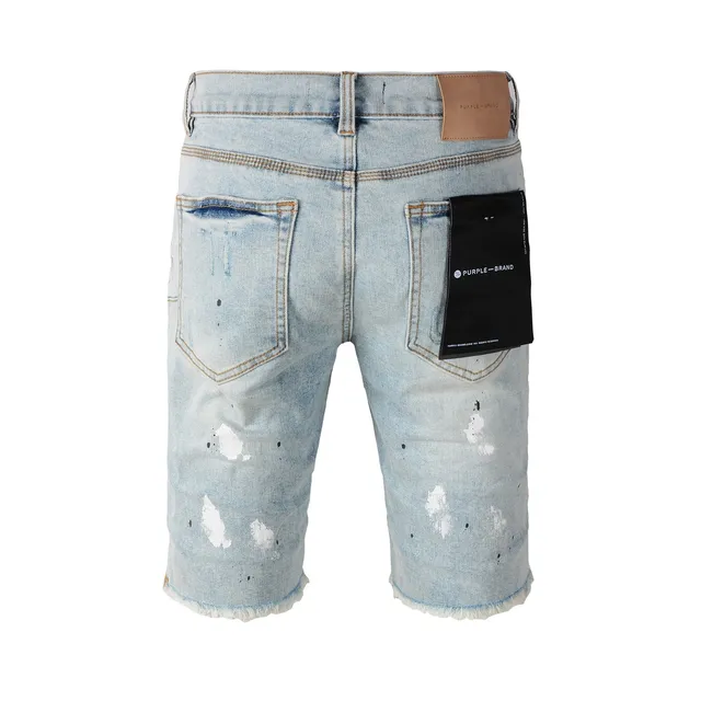Purple Brand shorts de denim distressed con salpicaduras de pintura y lavado ligero 22
