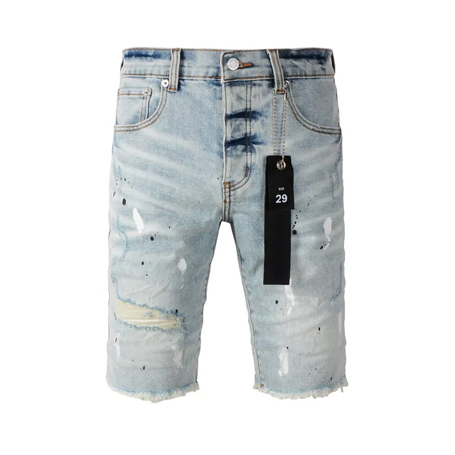 Purple Brand shorts de denim distressed con salpicaduras de pintura y lavado ligero 23