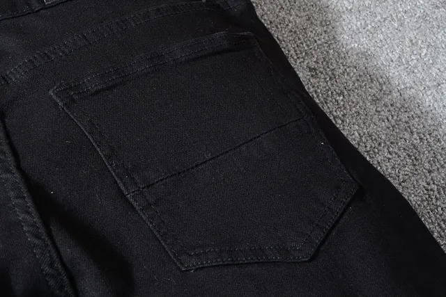 Stussy جينز أسود متعدد الألوان ممزق بقماش مقسم 4