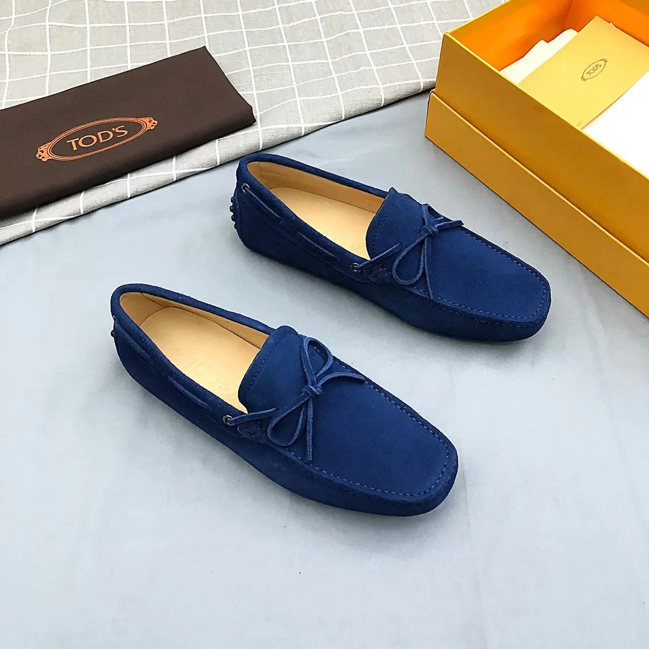 Mocasines Tod's de ante azul con lazo 2