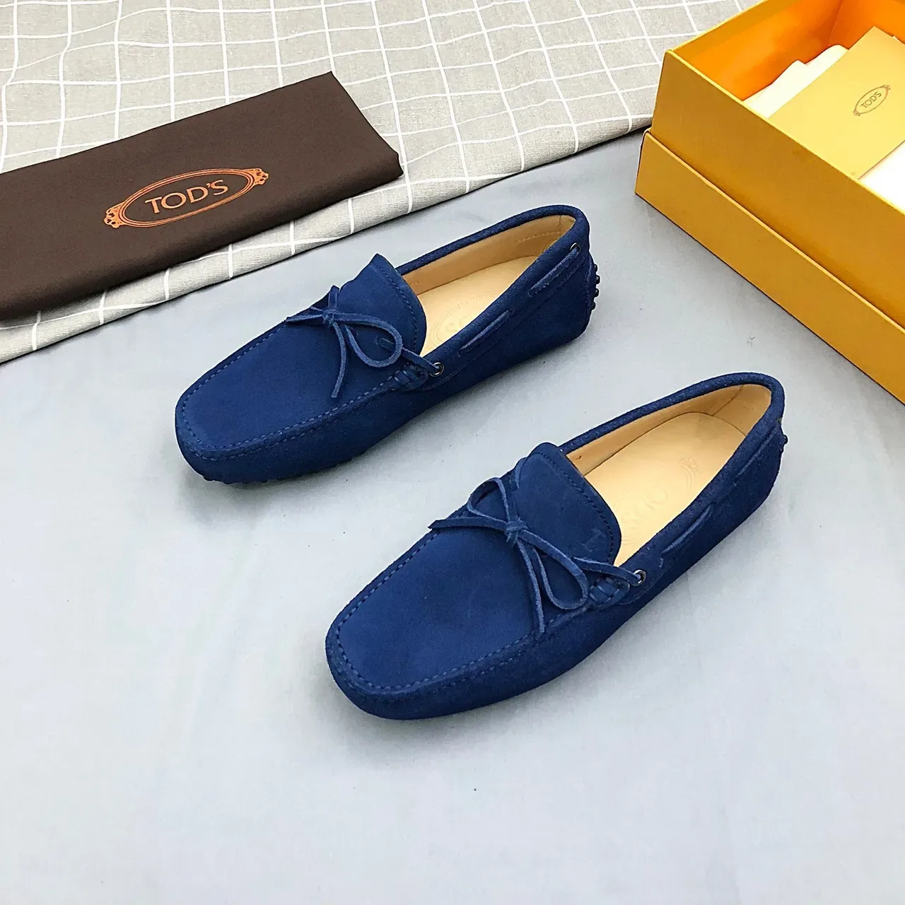 Mocasines Tod's de ante azul con lazo 3