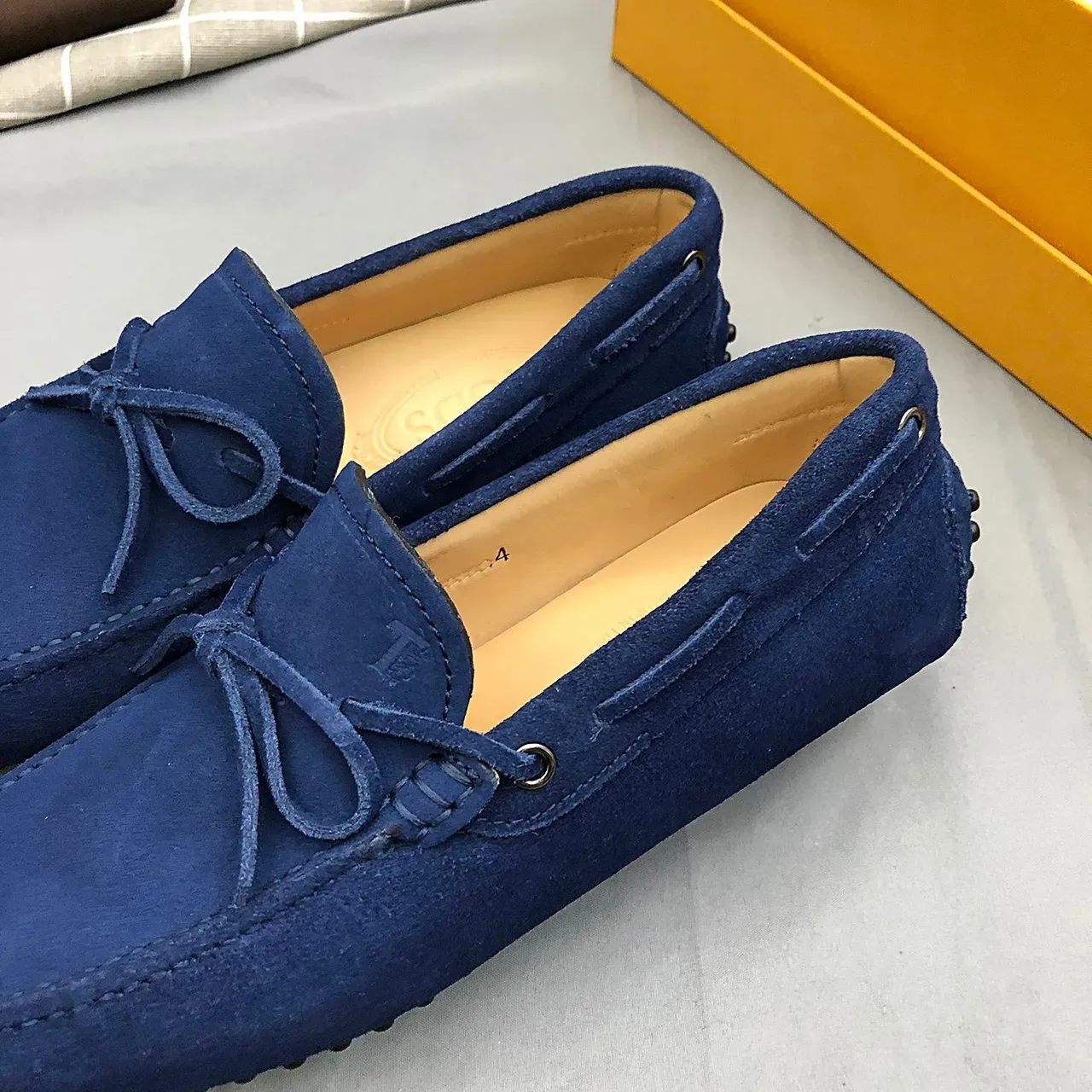 Mocasines Tod's de ante azul con lazo 5