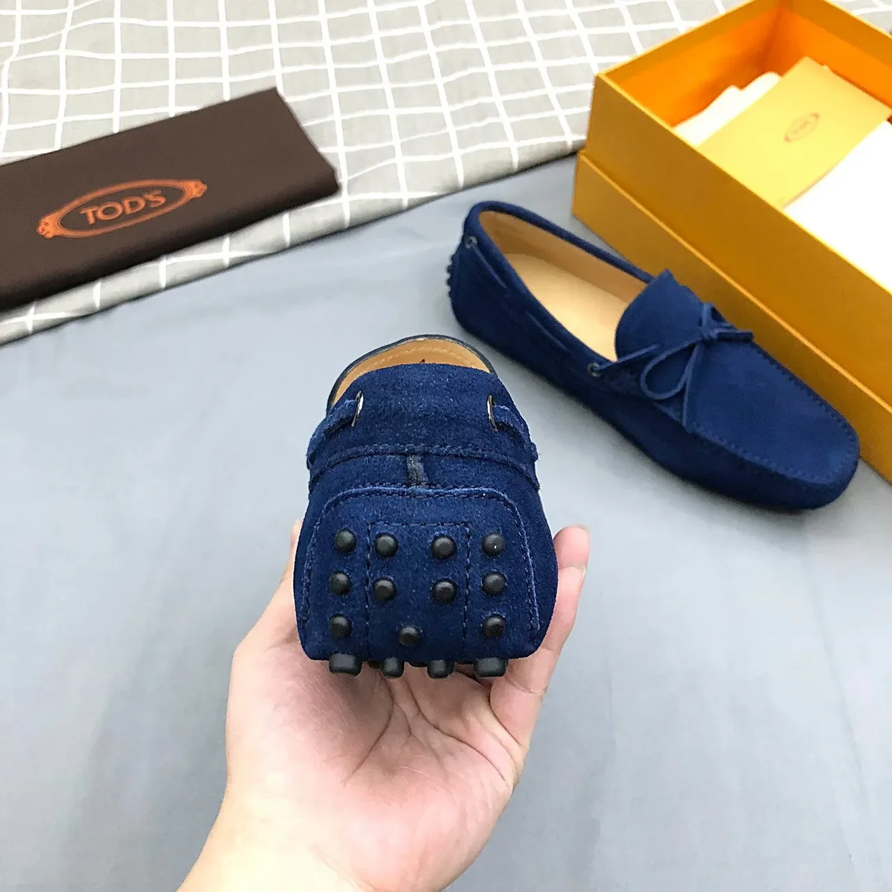 Mocasines Tod's de ante azul con lazo 6