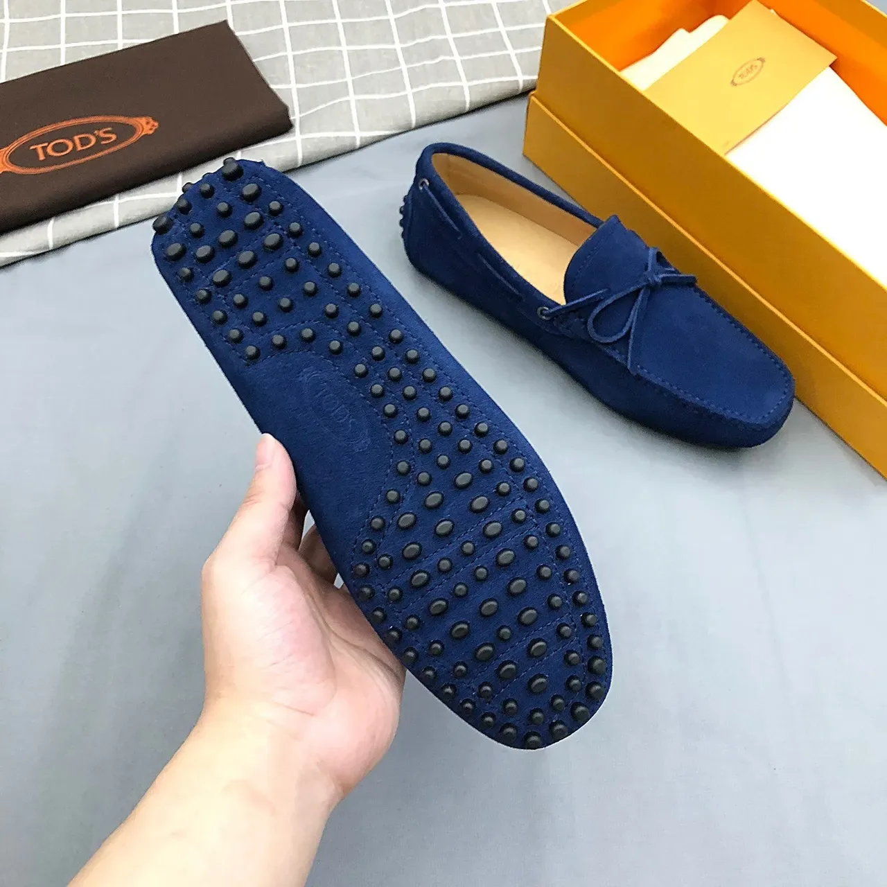 Mocasines Tod's de ante azul con lazo 7
