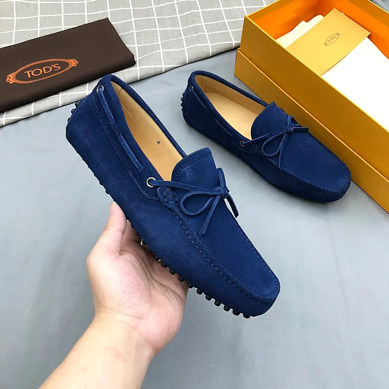 Mocasines Tod's de ante azul con lazo 8