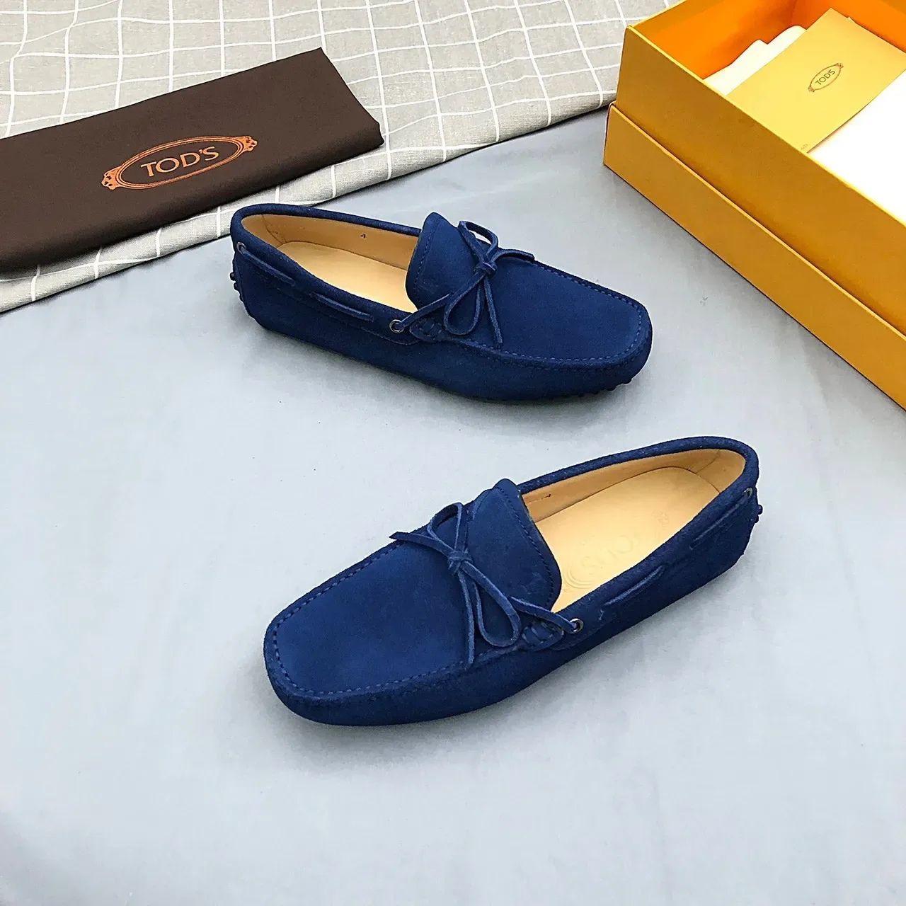 Mocasines Tod's de ante azul con lazo 9