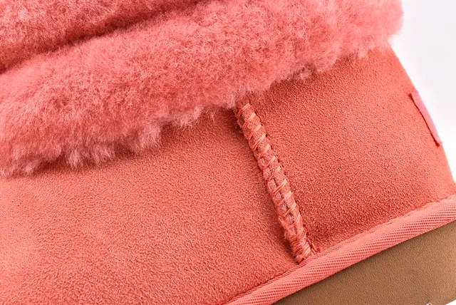 UGG Fluff Mini क्विल्टेड कॉरल पिंक बर्फीली बूट 4