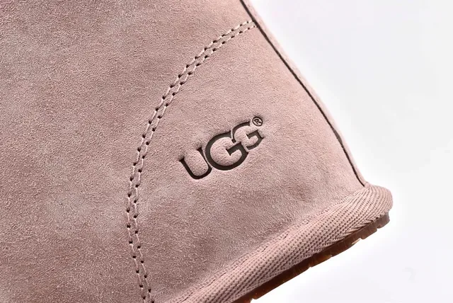 UGG মিনি বেলি বো বেইজ স্যুয়েড এনকেল বুটস 4