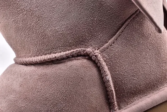 UGG মিনি বেলি বাউ টপ স্যুড বরফের জুতো 5