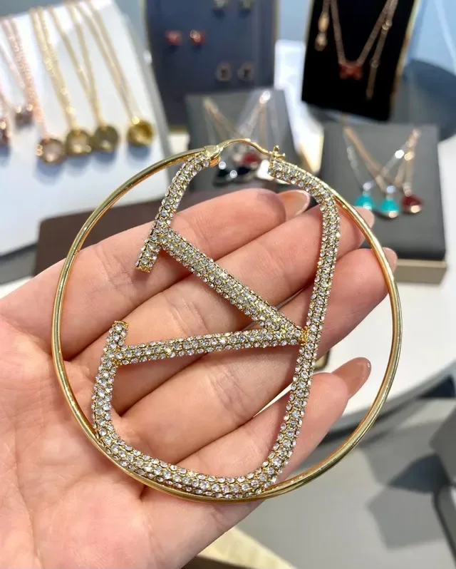 فالنتينو VLTN باڤيه كريستال أقراط أوزار ذهبية 5