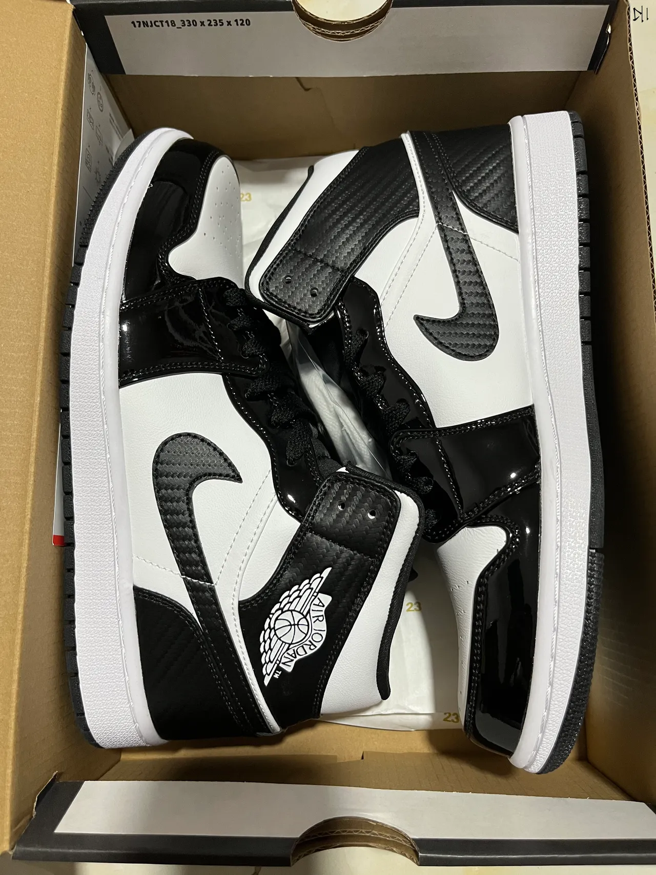 Air Jordan 1 chaussures de basketball montantes à texture en fibre de carbone noir et blanc 9