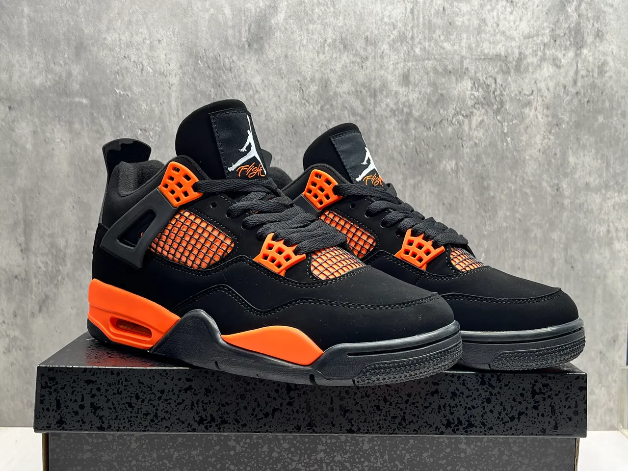حذاء كرة السلة Air Jordan 4 أسود وبرتقالي 4