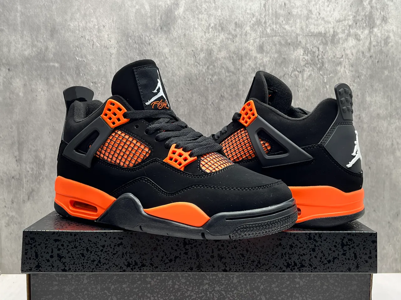 حذاء كرة السلة Air Jordan 4 أسود وبرتقالي 5