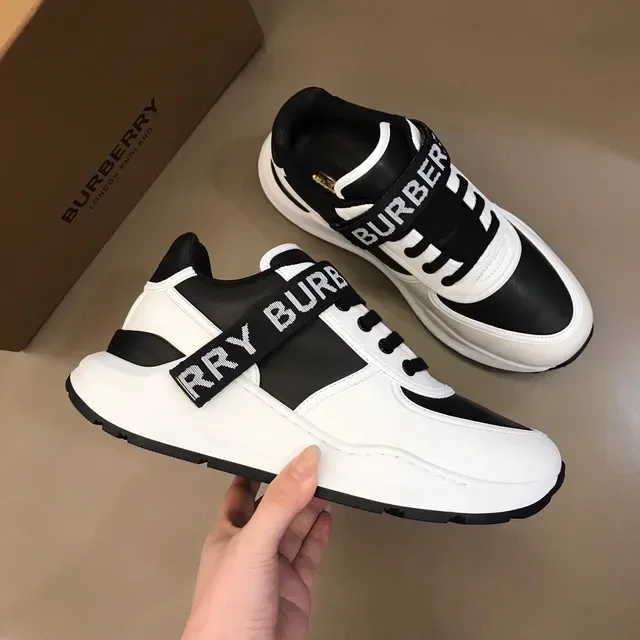 Burberry zapatillas lifestyle de dos tonos blanco y negro con correa logo 6