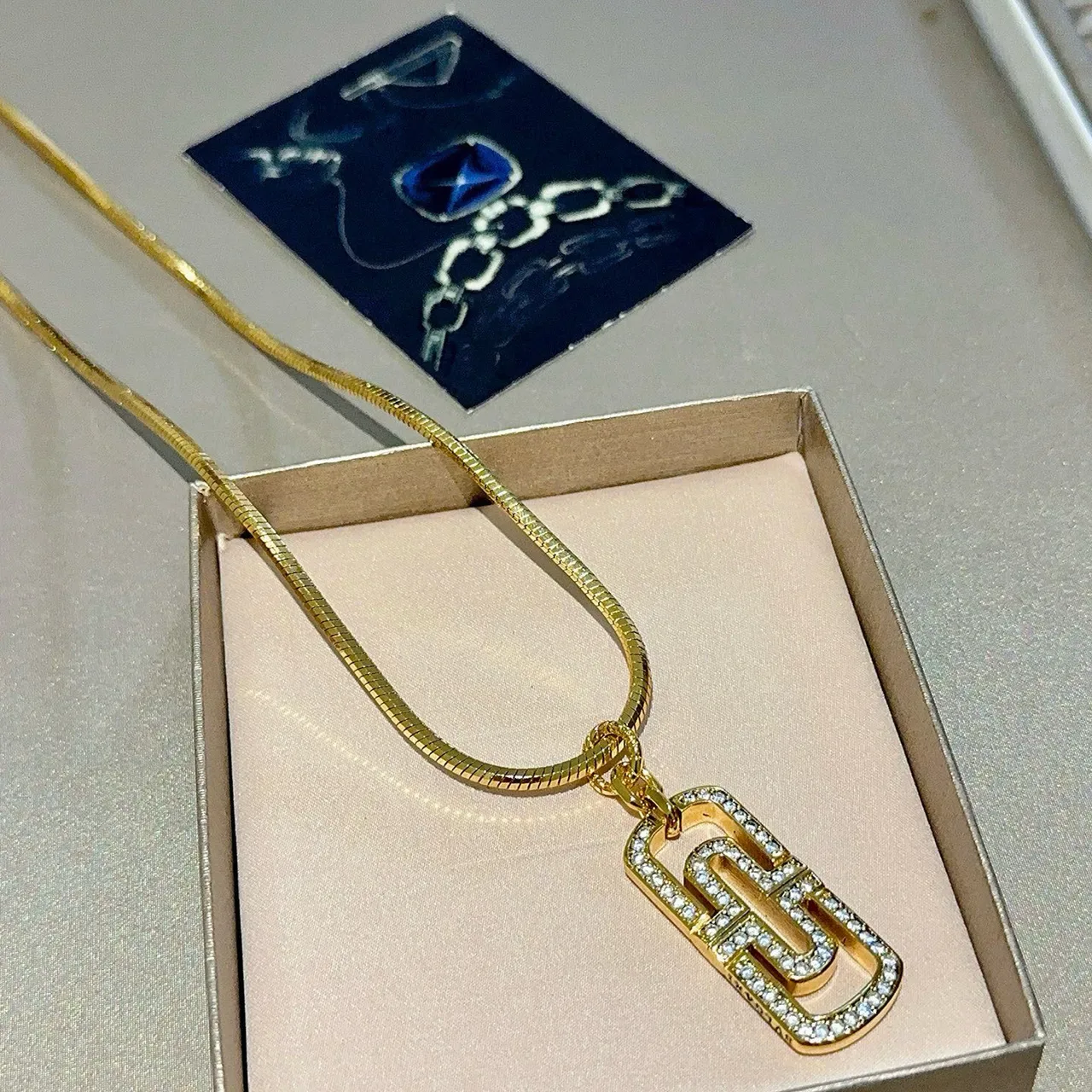 Bvlgari B.zero1 قلادة ذهبية سلسلة ثعبان شفافة Pavé Crystal-Set قلادة على شكل حرف G 6