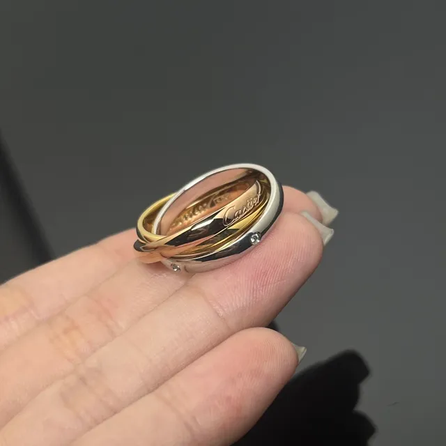خاتم Cartier Trinity Triple Band ذهبي وأسود بمينا 3