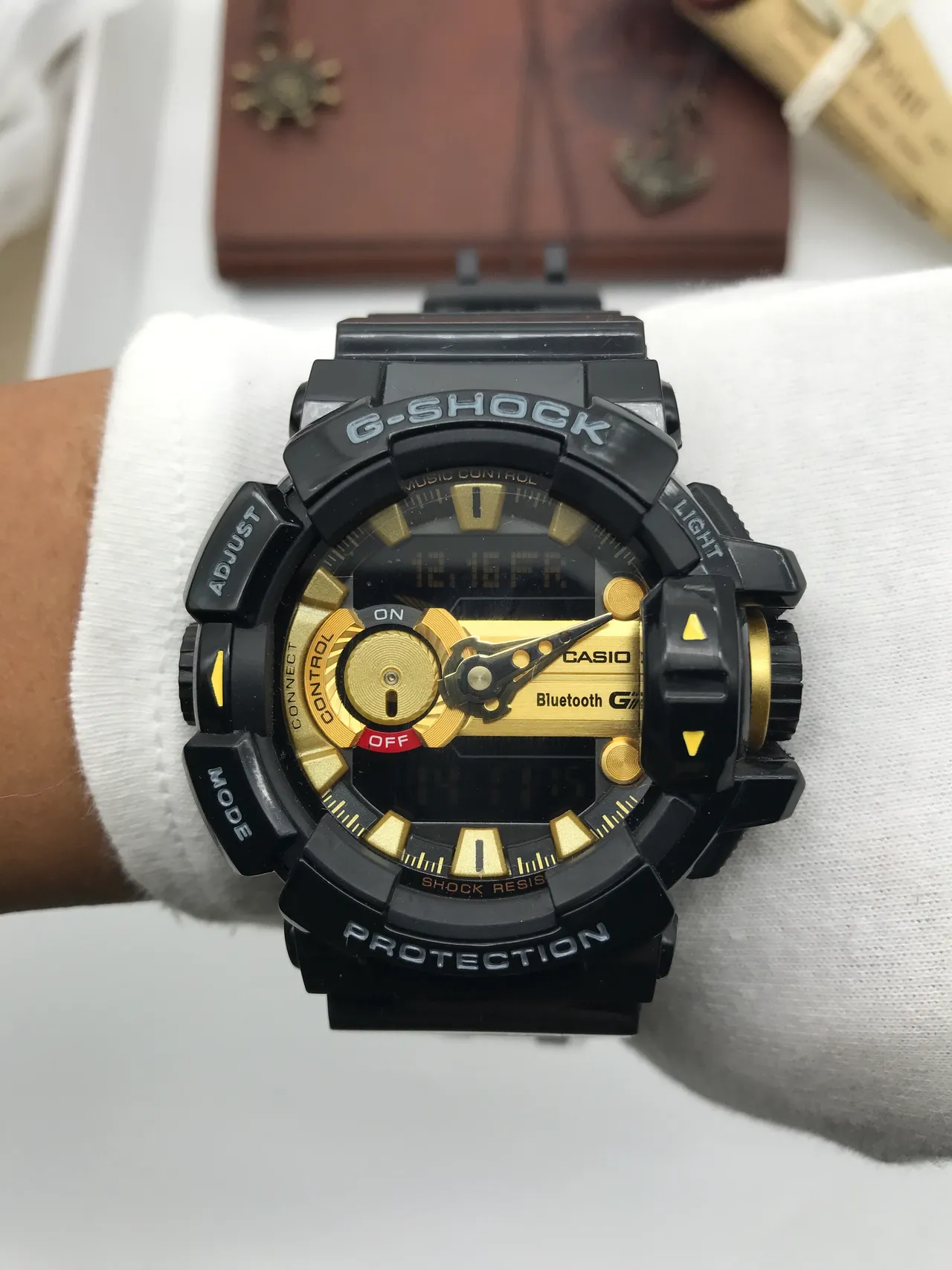 Casio G-Shock GA-100 ساعة رياضية سوداء وذهبية 6