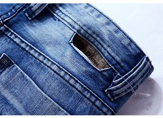 Diesel Medium-Wash Distressed Straight-Leg Jeans 8