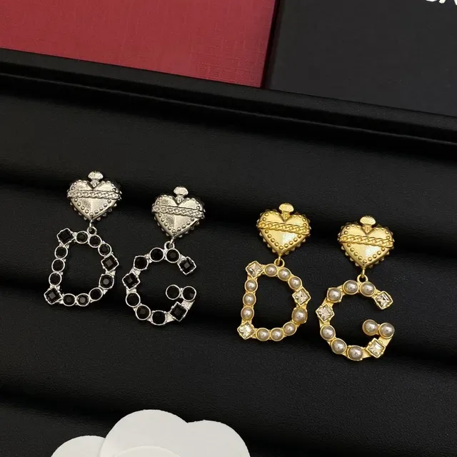 Dolce & Gabbana সোনা রূপা হার্ট শেপড টপ চেইন ডিটেল কানের দুল 6