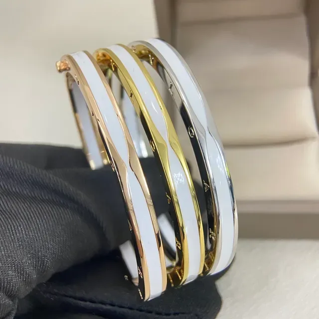Gold-Tone and White Enamel Hinged Bangle Bracelet 2