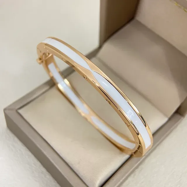 Gold-Tone and White Enamel Hinged Bangle Bracelet 4