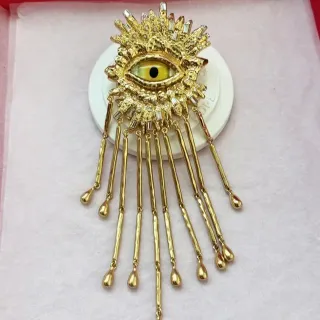 Gold Yellow Metal Eye Motif Centerpiece Brooch — catalogue photo via WWTop Yupoo