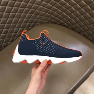 Zapatillas lifestyle Navy Orange con upper de malha de calcetín, superior esculpida, media suela ondulada