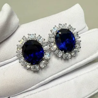 Brincos de gemas azuis oval halo cluster
