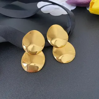 Brincos de disco ovalado empilhados dourado polido