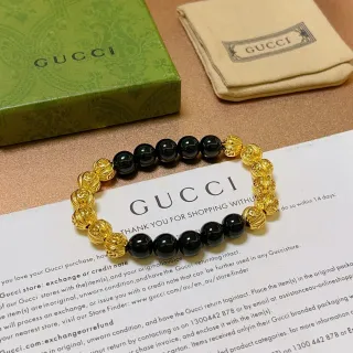 Gucci سوار أسود ذهبي خرز متناوب