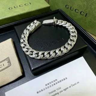 سوار Gucci فضي سميك Curb-Link نقش ورقة